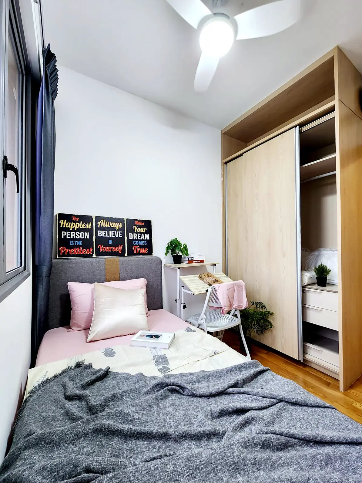 Single bed and sliding-door wardrobe in Harbour View Gardens Kampung Room 3