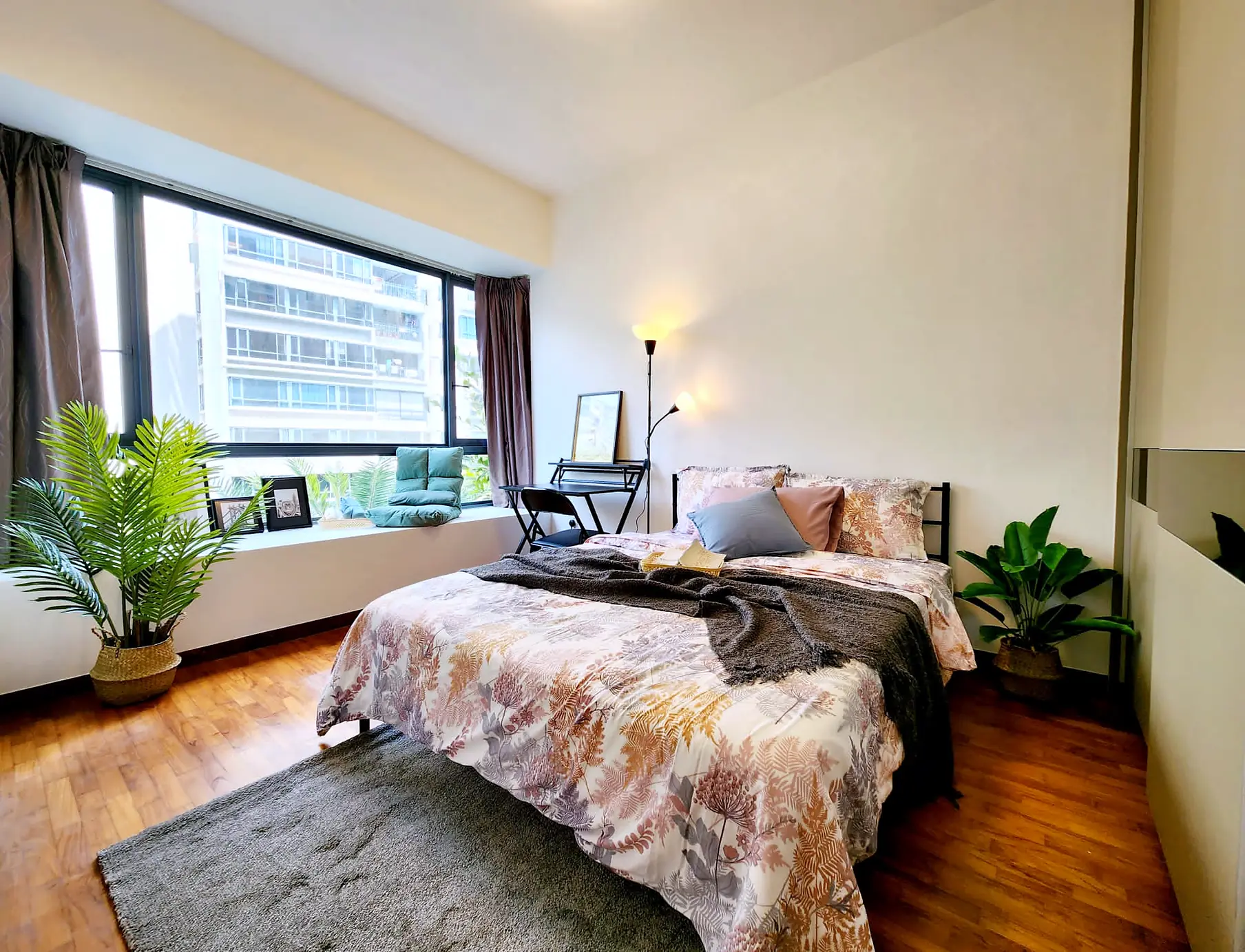 The Palette Rumah Suite Room 1 with queen bed, bay window seat and study desk